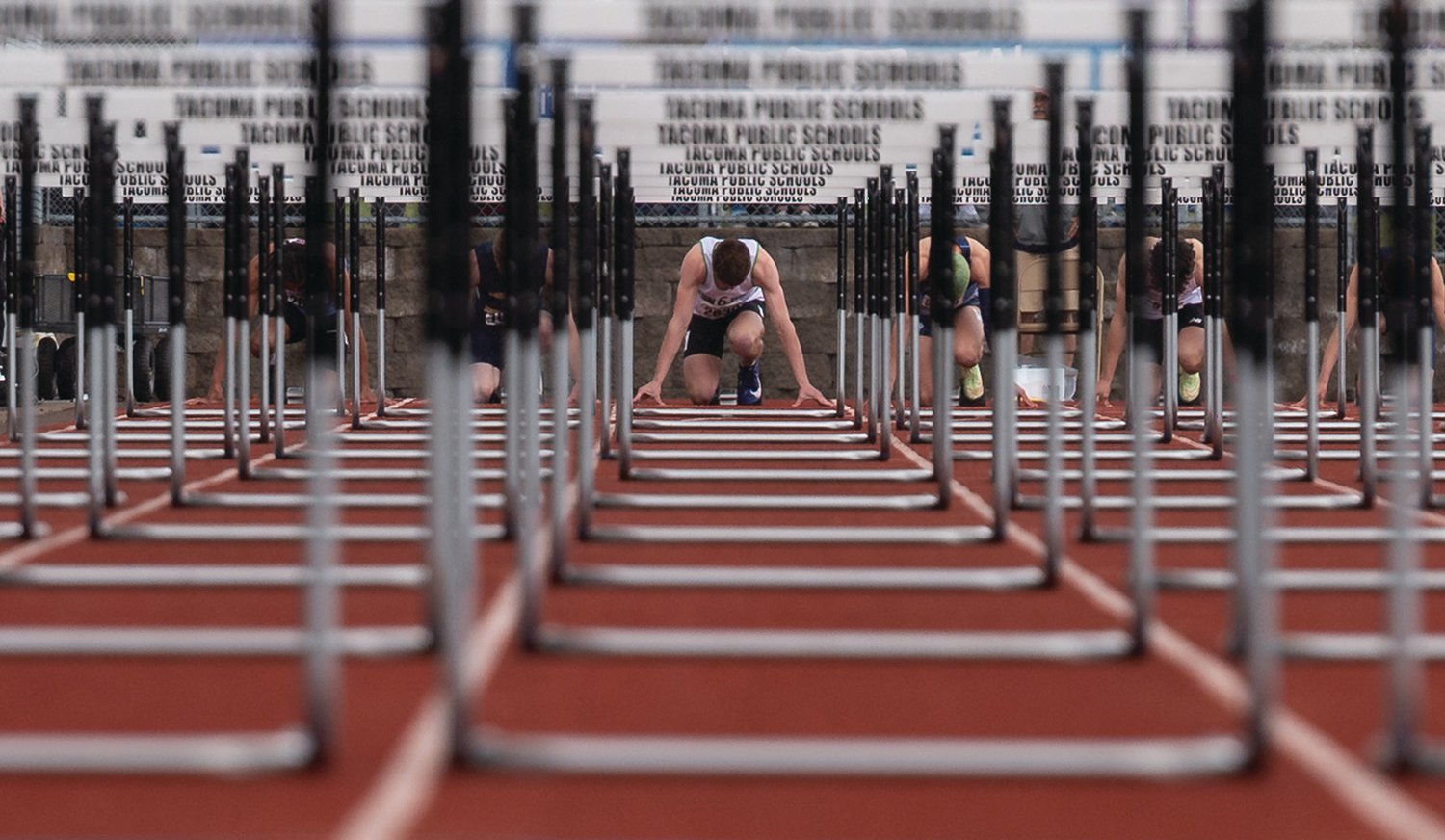 Tumwater's Seth Weller gets set on his mark in the 110 Hurdles at the 4A/3A/2A State Track and Field Championships on Friday, May 27, 2022, at Mount Tahoma High School in Tacoma. (Joshua Hart/For ScorebookLive)